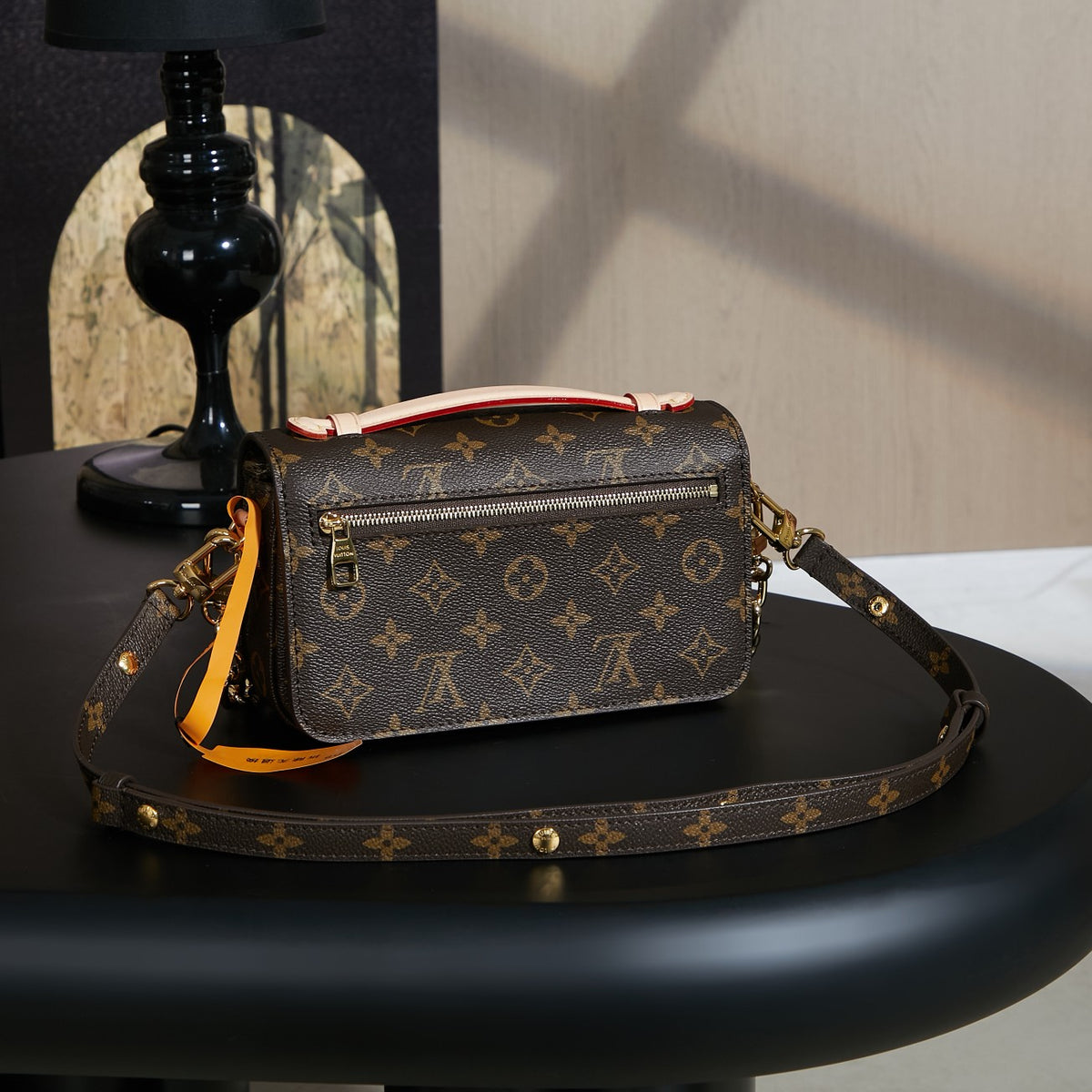 LV Pochette Métis East West